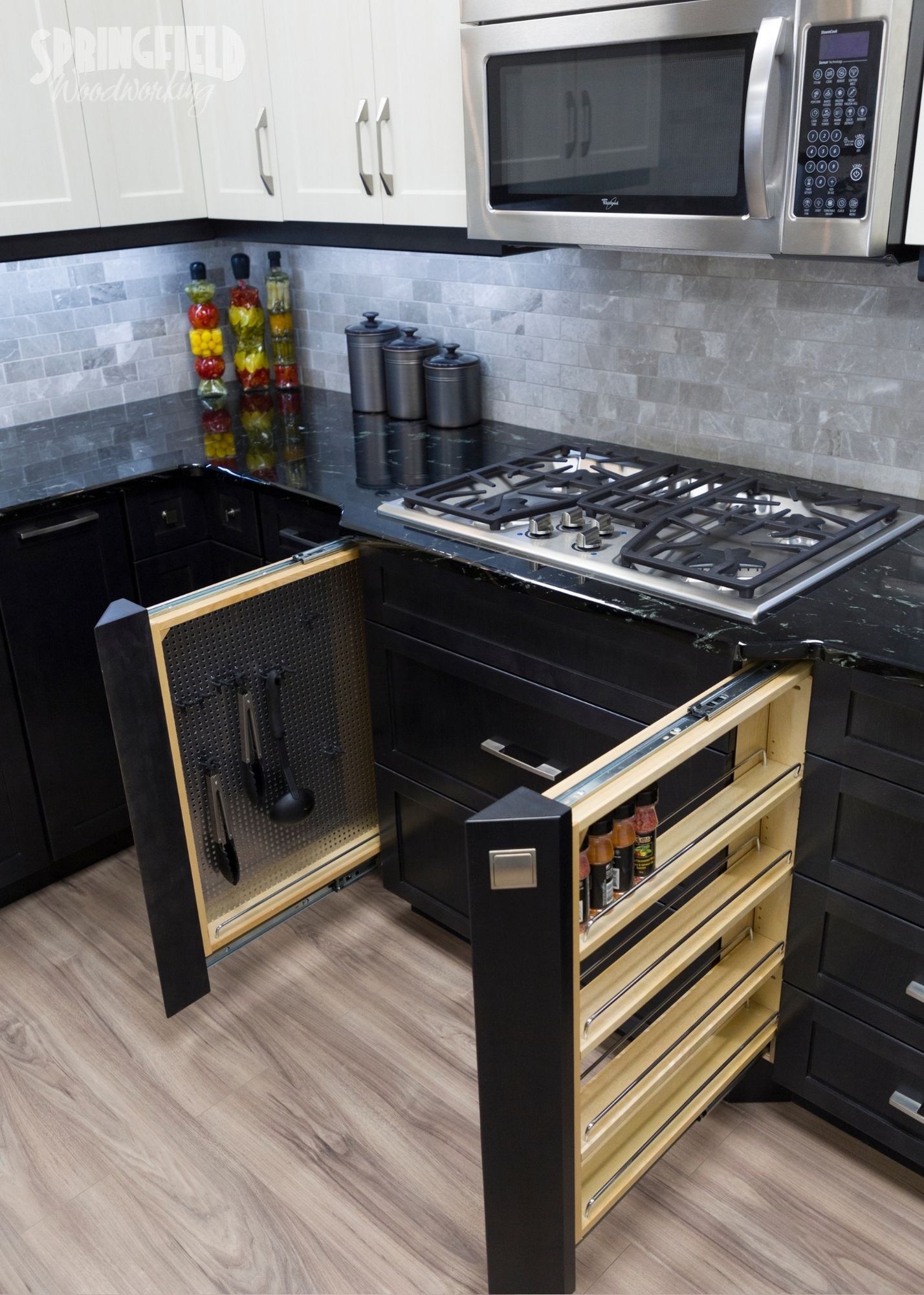 black white custom kitchen with pullouts and accessories